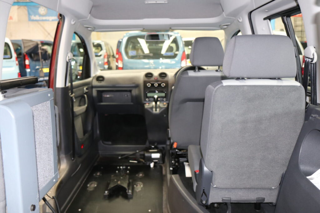 VW Caddy passenger wheelchair upfront